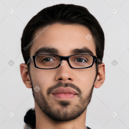 Neutral white young-adult male with short  black hair and brown eyes