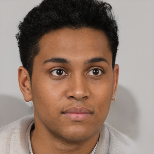 Neutral latino young-adult male with short  brown hair and brown eyes