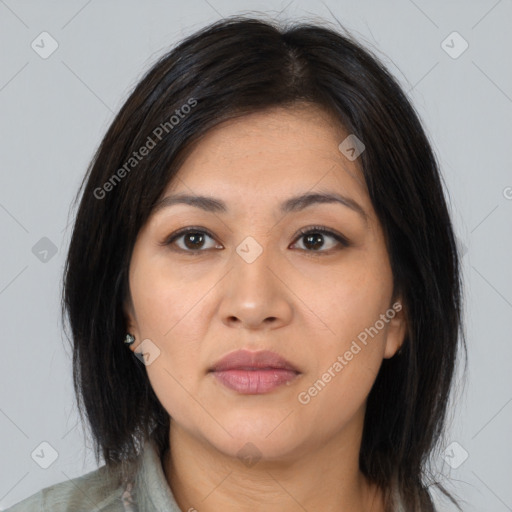 Joyful asian young-adult female with long  brown hair and brown eyes