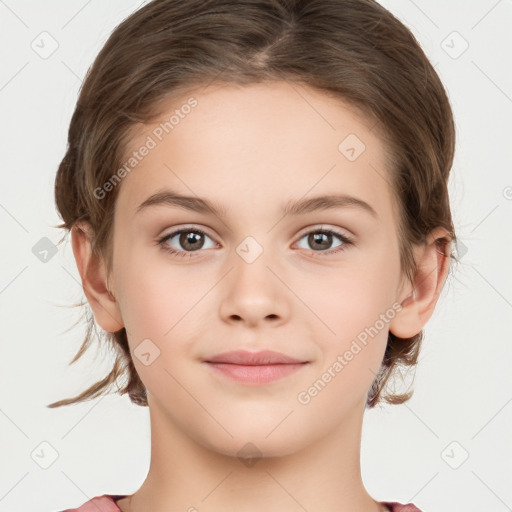 Joyful white child female with medium  brown hair and grey eyes