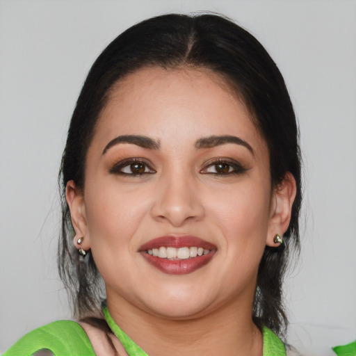 Joyful white young-adult female with medium  brown hair and brown eyes