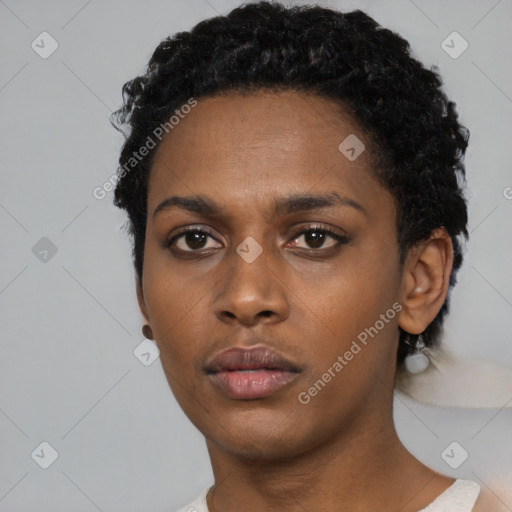 Neutral black young-adult female with short  black hair and brown eyes