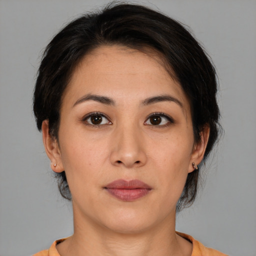 Neutral asian young-adult female with medium  brown hair and brown eyes