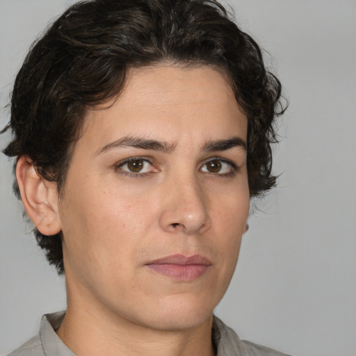 Neutral white young-adult female with short  brown hair and brown eyes