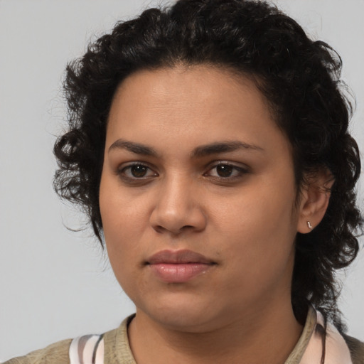 Neutral latino young-adult female with medium  brown hair and brown eyes
