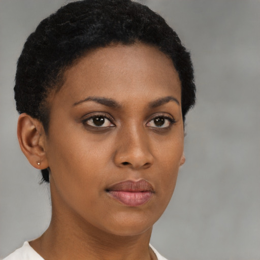 Neutral black young-adult female with short  brown hair and brown eyes