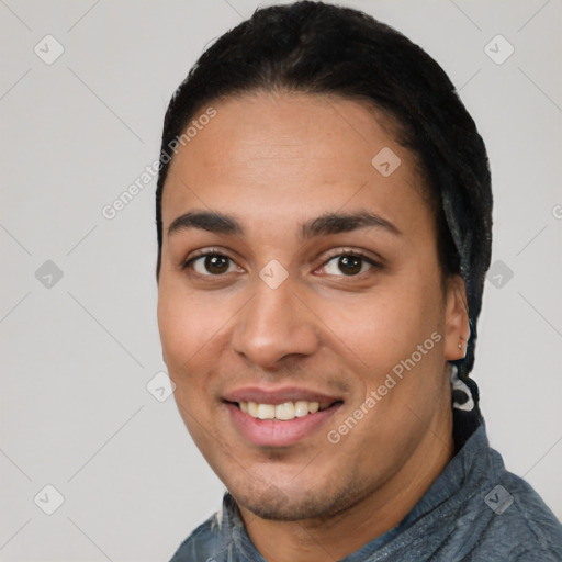 Joyful white young-adult male with short  black hair and brown eyes