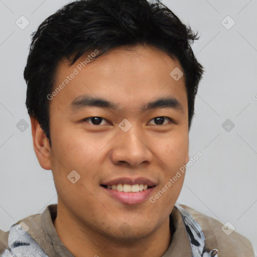 Joyful asian young-adult male with short  brown hair and brown eyes