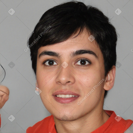 Joyful white young-adult male with short  black hair and brown eyes