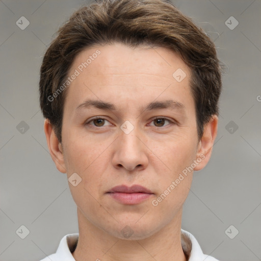 Joyful white adult male with short  brown hair and brown eyes