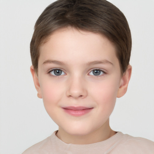 Joyful white child female with short  brown hair and brown eyes