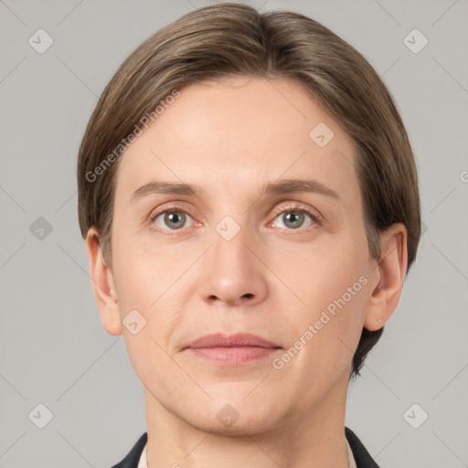 Joyful white young-adult female with short  brown hair and grey eyes