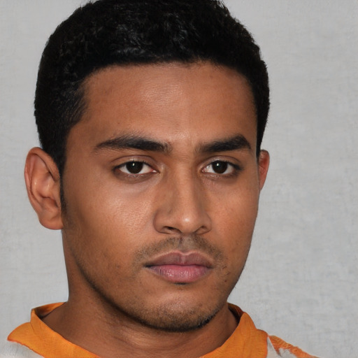Neutral latino young-adult male with short  black hair and brown eyes