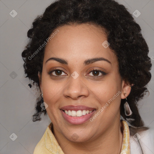 Joyful black young-adult female with medium  brown hair and brown eyes