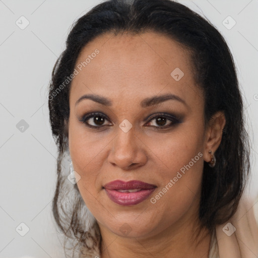 Joyful black young-adult female with medium  brown hair and brown eyes