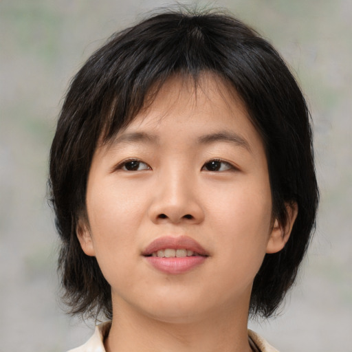 Neutral asian young-adult female with medium  brown hair and brown eyes