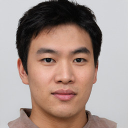 Neutral asian young-adult male with short  brown hair and brown eyes