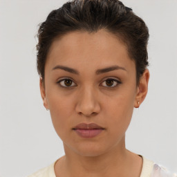 Neutral white young-adult female with short  brown hair and brown eyes