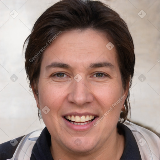 Joyful white adult female with medium  brown hair and brown eyes