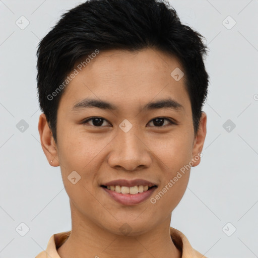 Joyful asian young-adult male with short  black hair and brown eyes