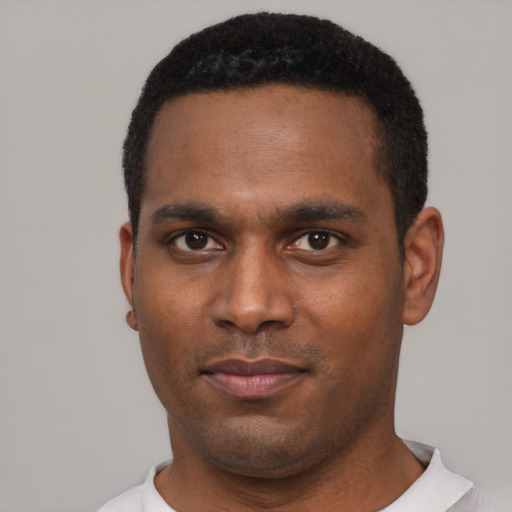 Neutral black young-adult male with short  black hair and brown eyes