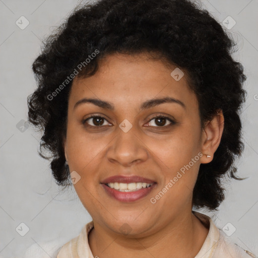 Joyful latino adult female with short  brown hair and brown eyes