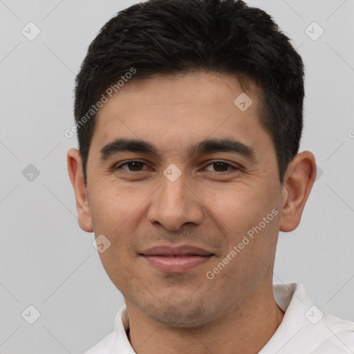 Joyful white young-adult male with short  black hair and brown eyes