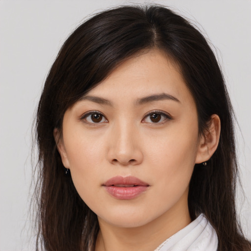 Neutral asian young-adult female with long  brown hair and brown eyes