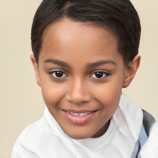 Joyful latino child female with short  brown hair and brown eyes