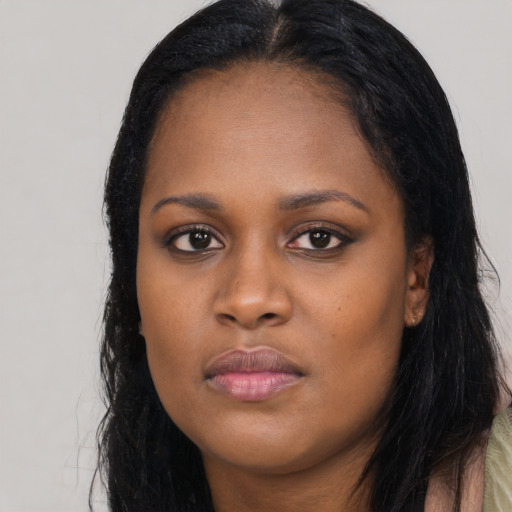 Neutral black young-adult female with long  black hair and brown eyes