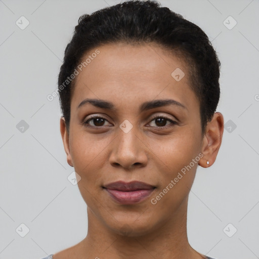 Joyful latino young-adult female with short  black hair and brown eyes