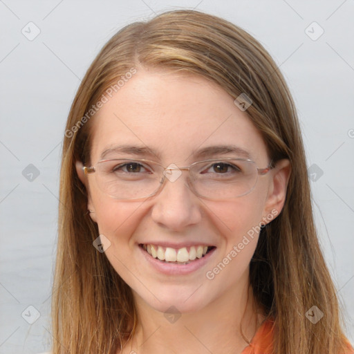 Joyful white young-adult female with long  brown hair and blue eyes