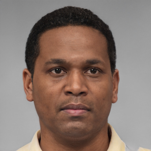 Neutral latino young-adult male with short  brown hair and brown eyes