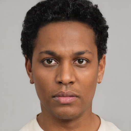 Neutral black young-adult male with short  black hair and brown eyes