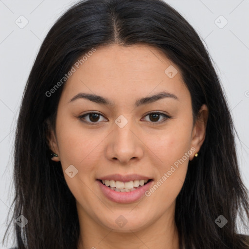 Joyful asian young-adult female with long  brown hair and brown eyes