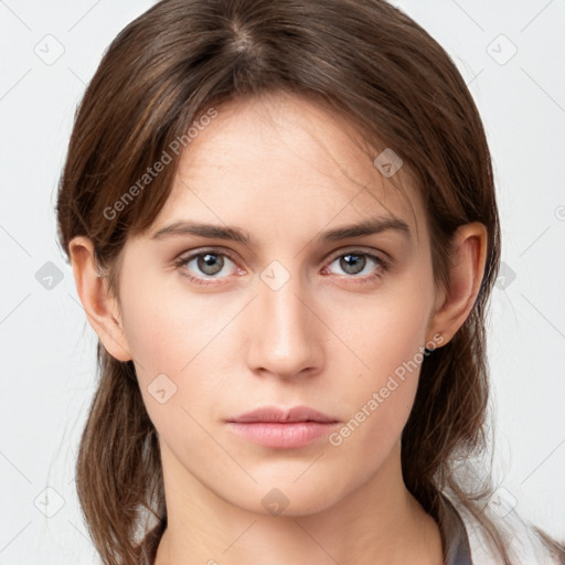 Neutral white young-adult female with medium  brown hair and grey eyes