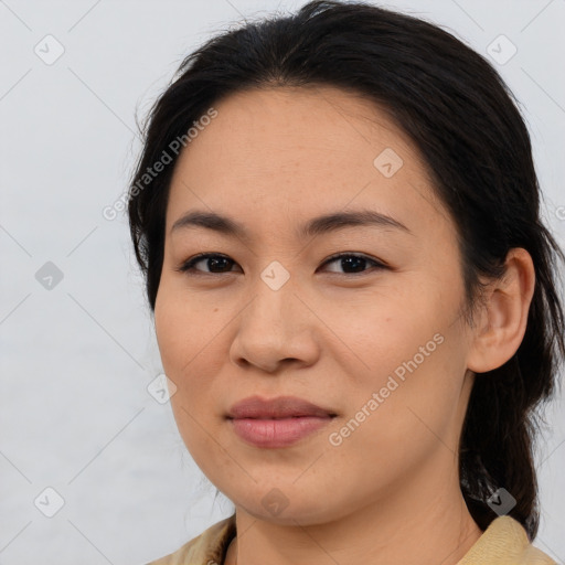 Joyful asian young-adult female with medium  brown hair and brown eyes