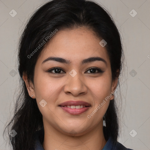 Joyful latino young-adult female with medium  brown hair and brown eyes