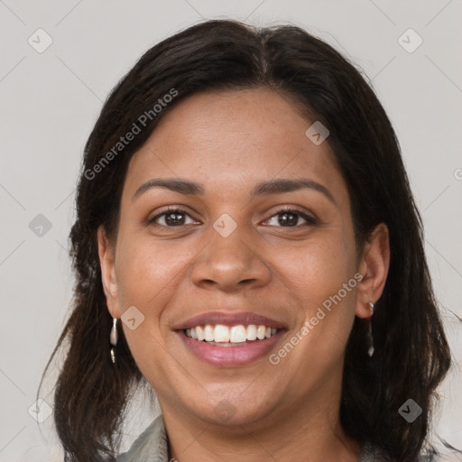 Joyful white adult female with medium  brown hair and brown eyes