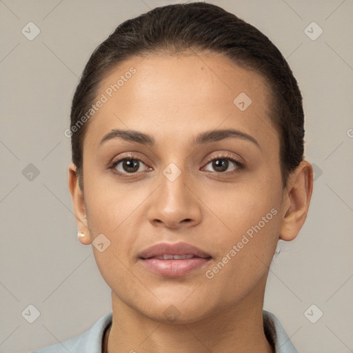 Joyful white young-adult female with short  brown hair and brown eyes