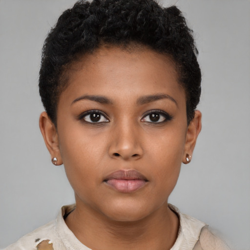 Neutral black young-adult female with short  brown hair and brown eyes