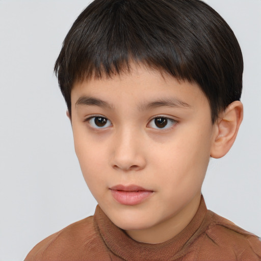 Neutral asian child male with short  brown hair and brown eyes