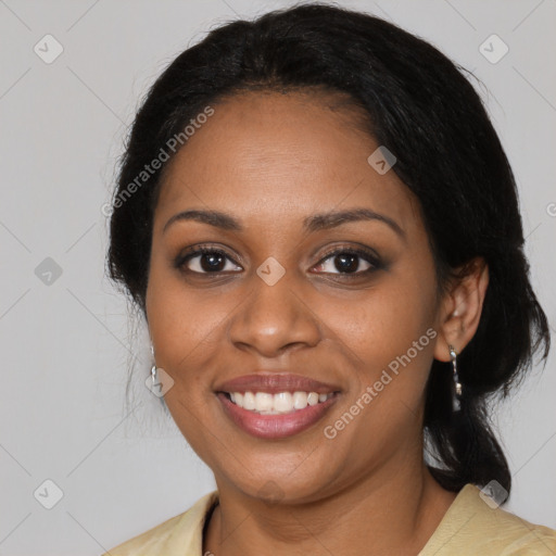 Joyful black young-adult female with medium  brown hair and brown eyes