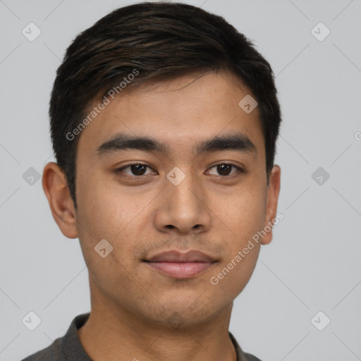 Joyful latino young-adult male with short  black hair and brown eyes