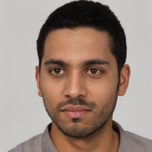 Neutral latino young-adult male with short  black hair and brown eyes