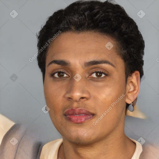 Joyful latino young-adult female with short  black hair and brown eyes