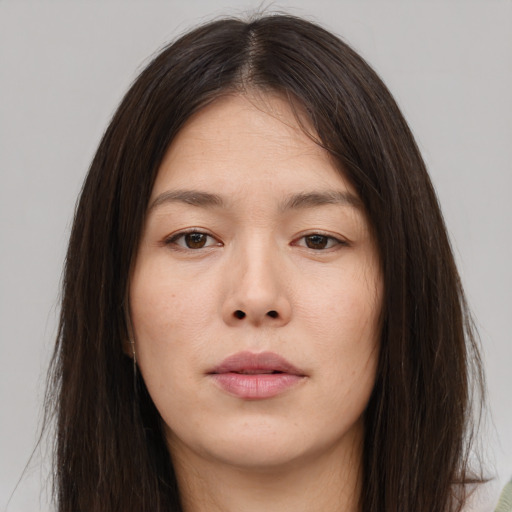 Neutral asian young-adult female with long  brown hair and brown eyes