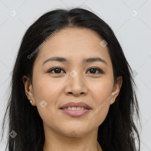 Joyful asian young-adult female with long  brown hair and brown eyes