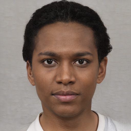Neutral black young-adult male with short  black hair and brown eyes