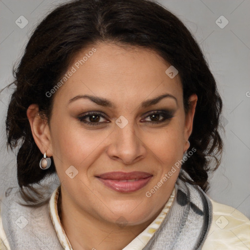 Joyful latino adult female with medium  brown hair and brown eyes